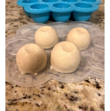 Cubes of sourdough in front of blue silicone tray