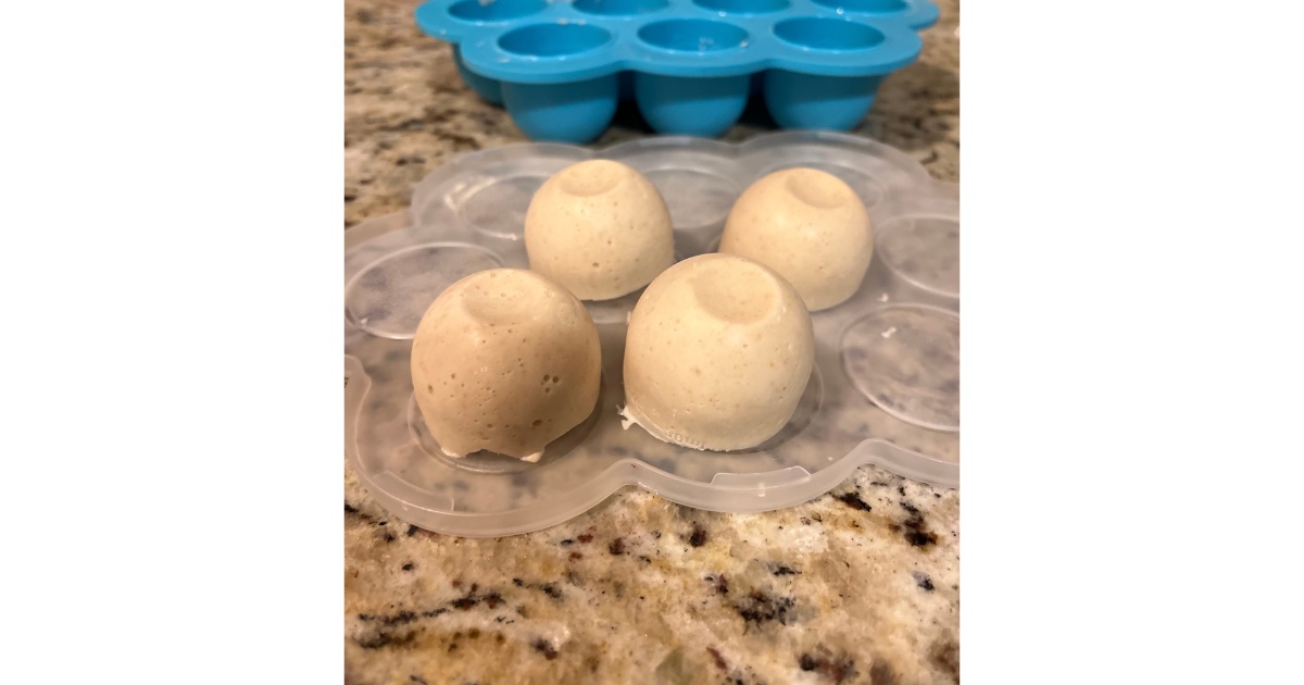 Cubes of sourdough in front of blue silicone tray