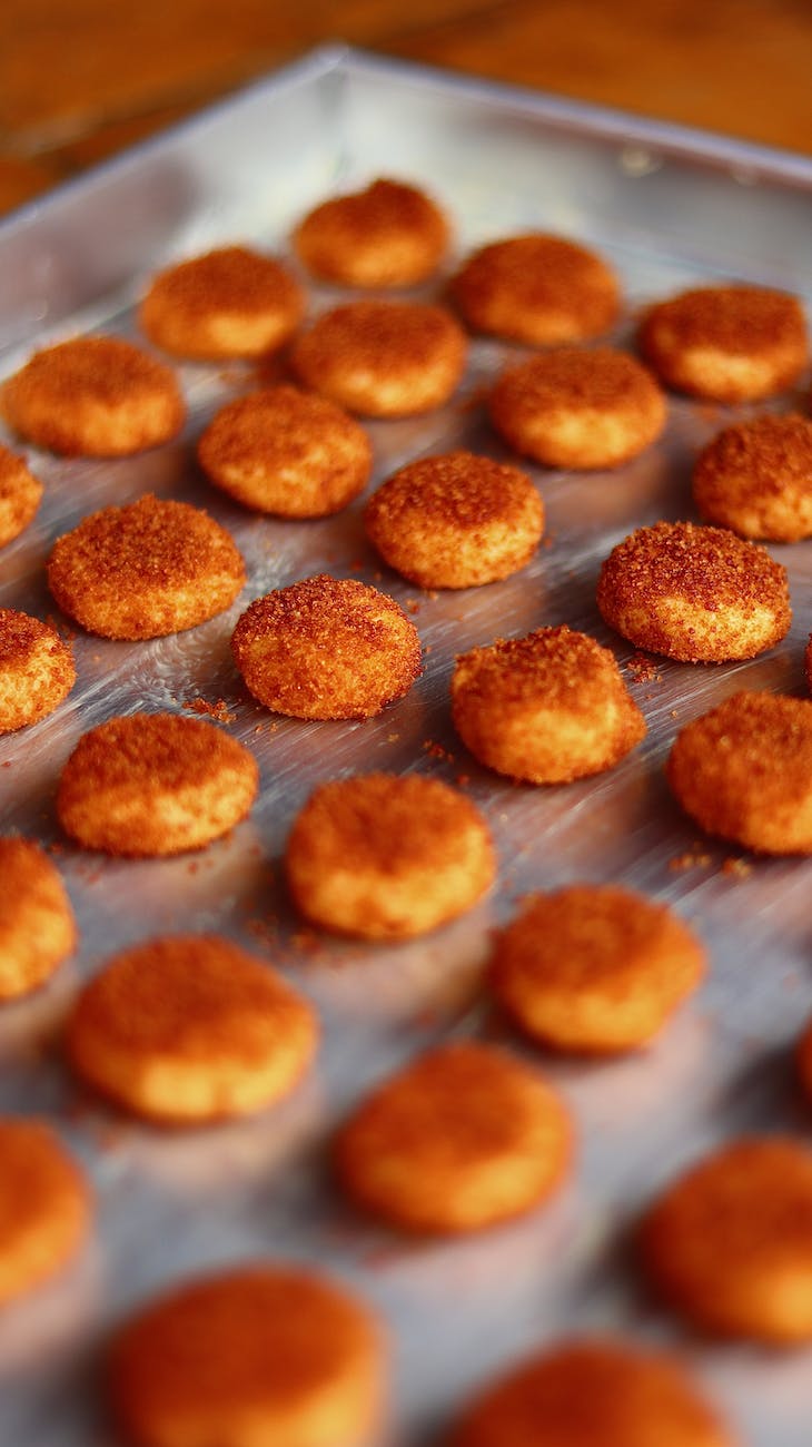 crispy chicken nuggets on metal tray