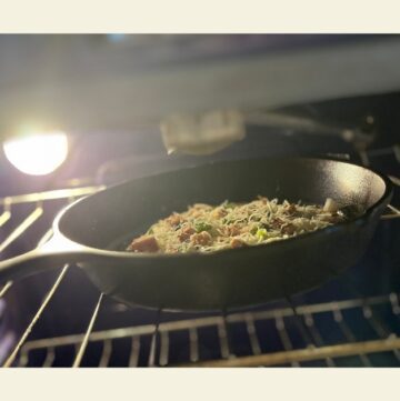 Sourdough BBQ pizza in a cast iron skillet within the oven.