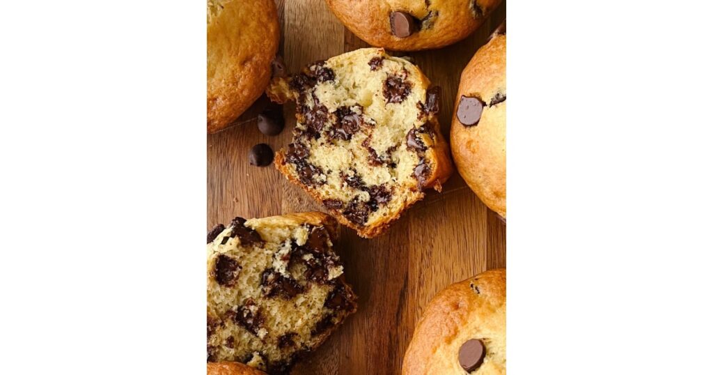 Chocolate chip muffins with one split down the middle