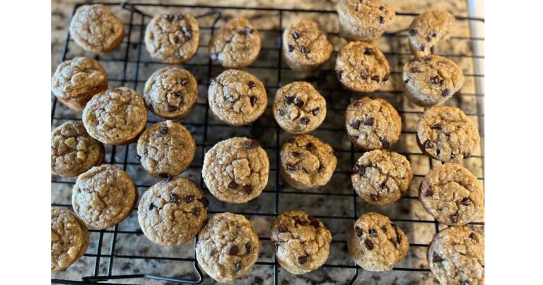 sourdough banana muffins on cooling rack close up