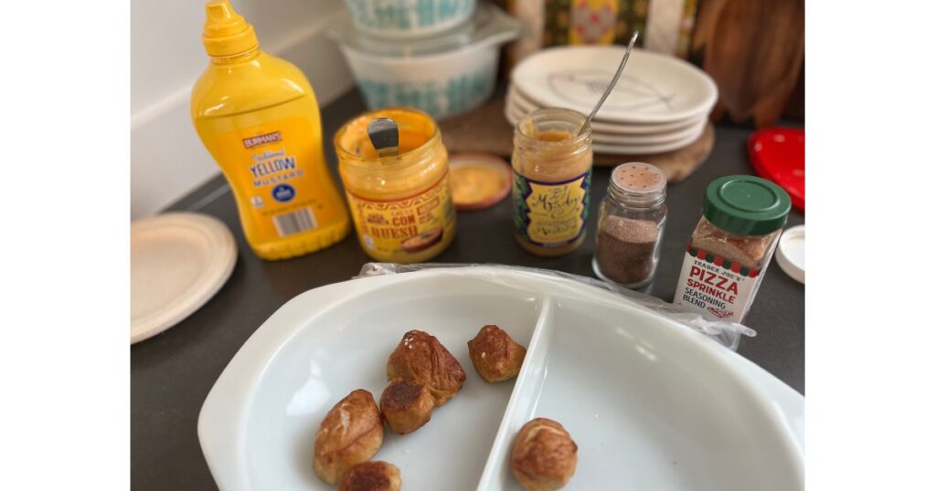 pretzel bites with toppings behind them