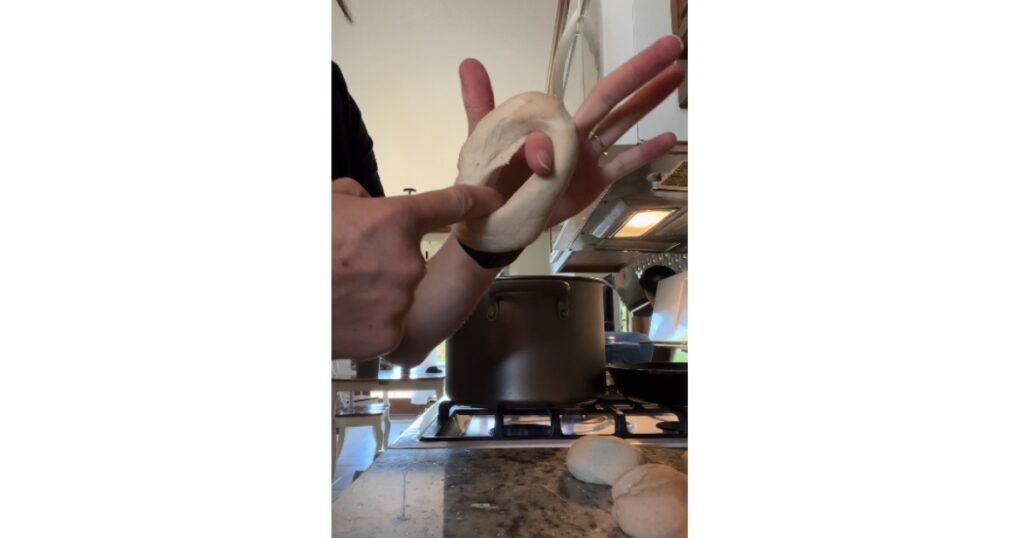 Forming a bagel between fingers