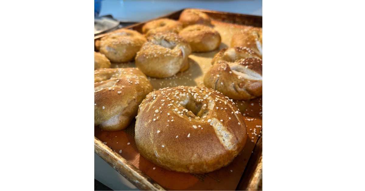 10 pretzel bagels on a sheet pan