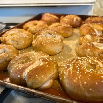 sourdough pretzel bagels on a pan