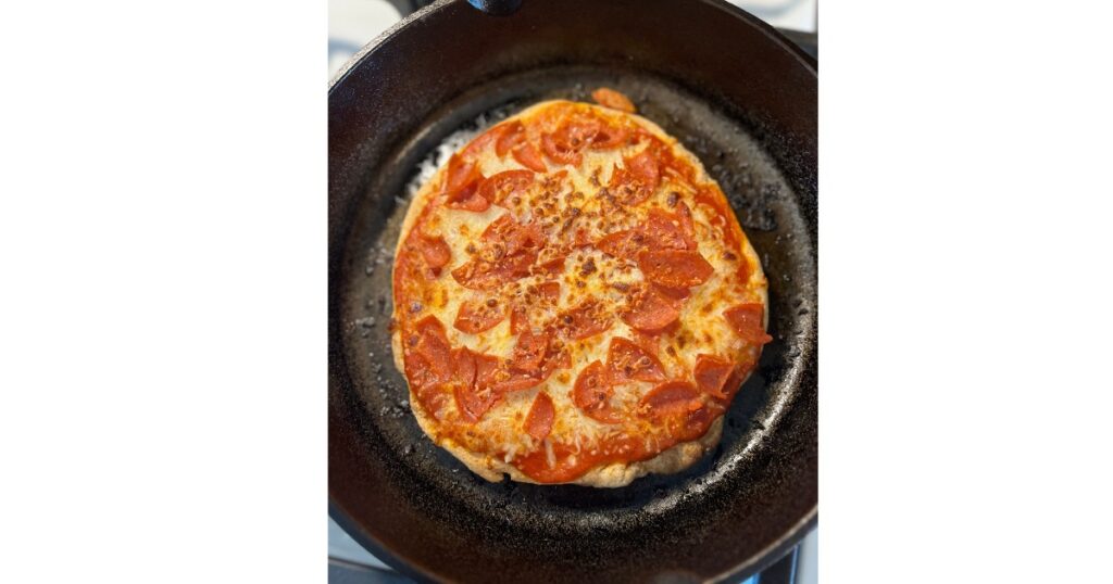 pizza in a cast iron skillet