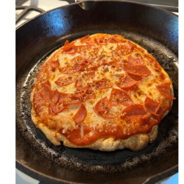 sourdough pizza in cast iron skillet