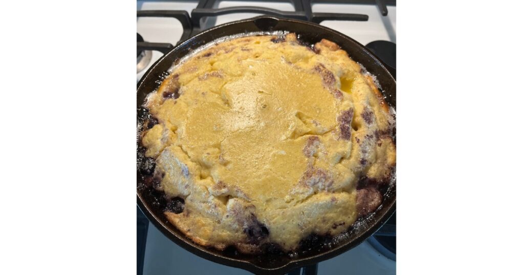 cooked sourdough dutch baby with blueberries -