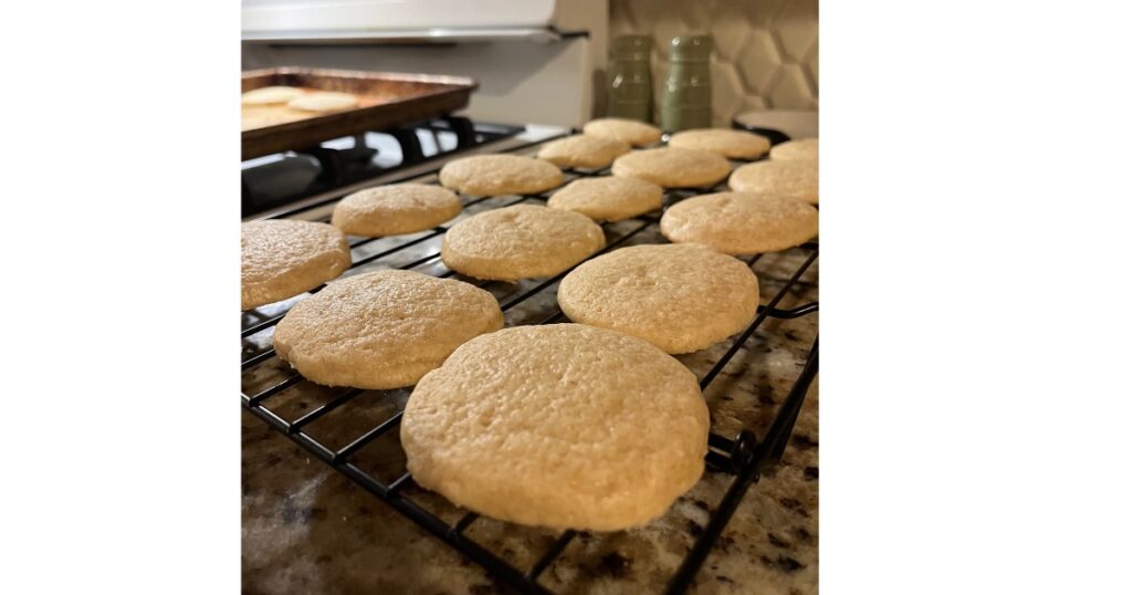 sourdough sugar cookies on cooling rack