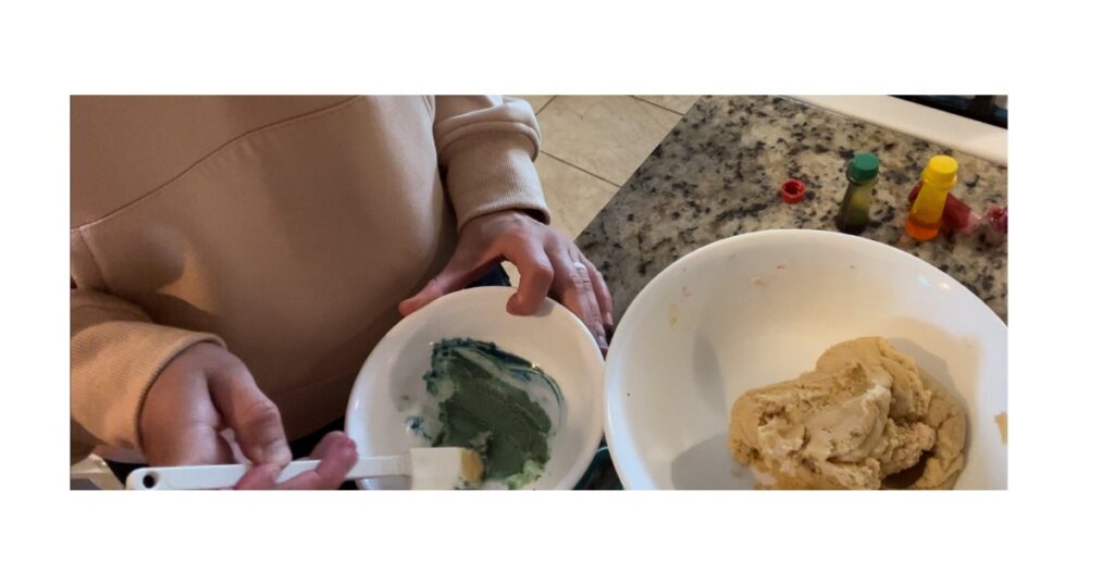 colored cookie dough in different bowls