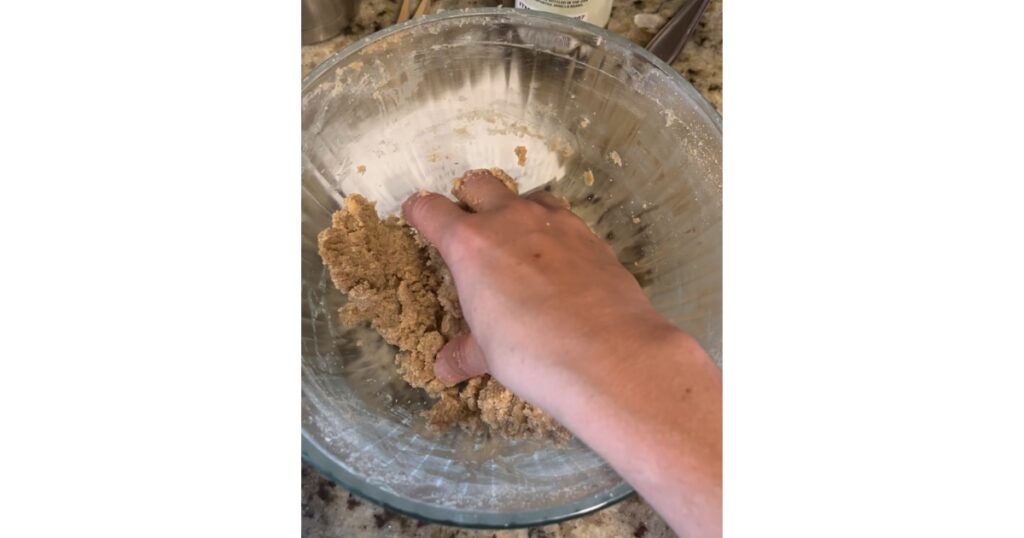 mash crumble with hands