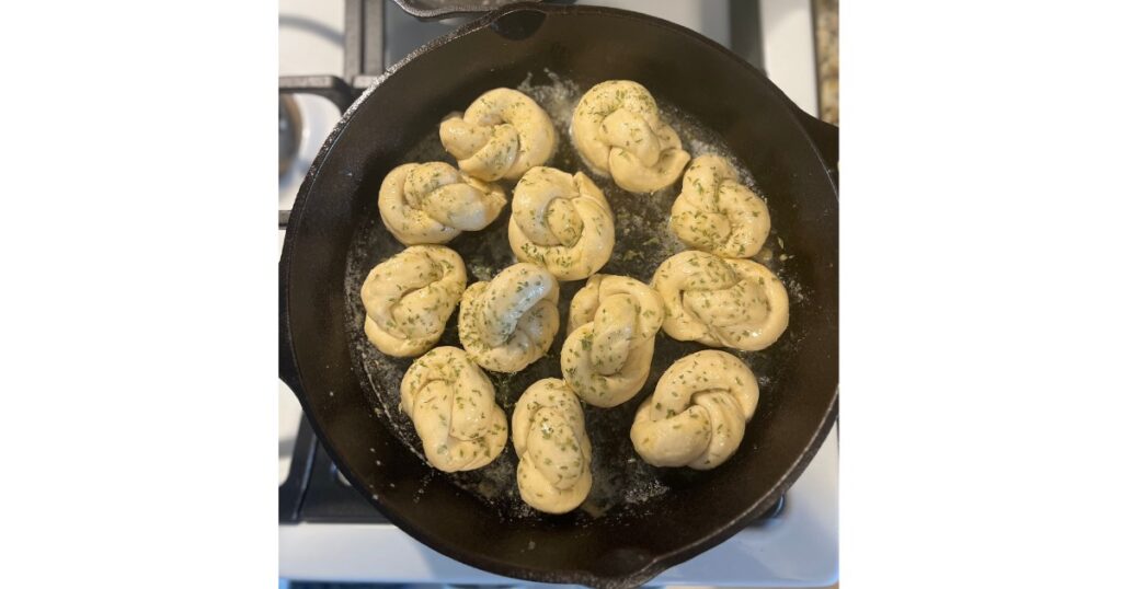 garlic knots in cast iron skillet