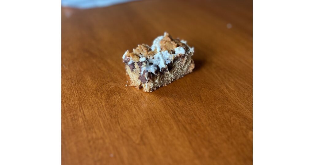 sourdough s'mores bar slice on wood table