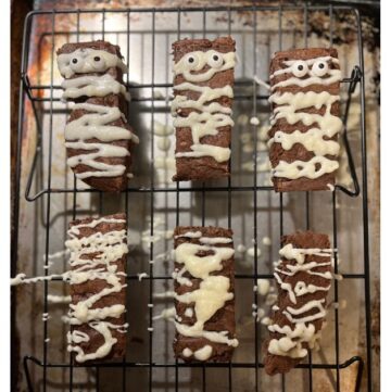 sourdough mummy brownies on wire rack sheet pan