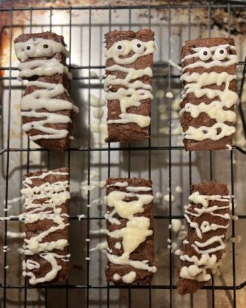 sourdough mummy brownies on wire rack sheet pan