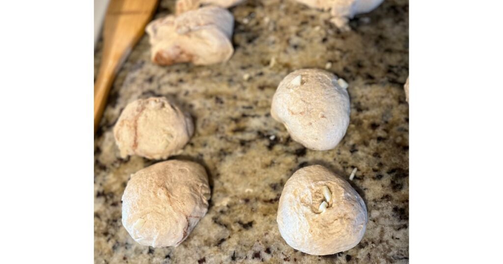 apple cinnamon sourdough bagel dough on counter