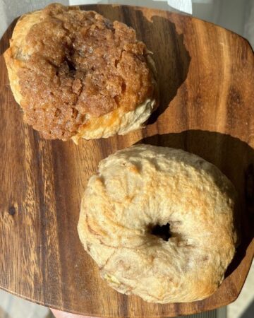 two sourdough cinnamon bagels