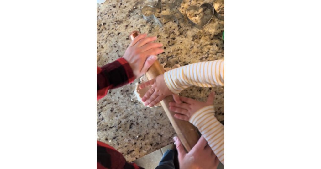 mom and child rolling salt dough