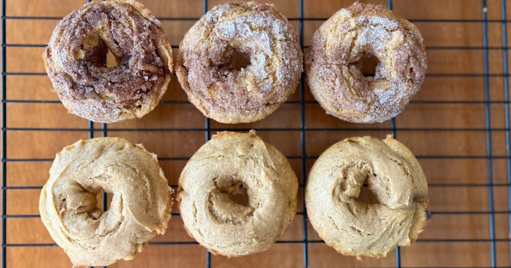 sourdough discard pumpkin donuts on cooling rack