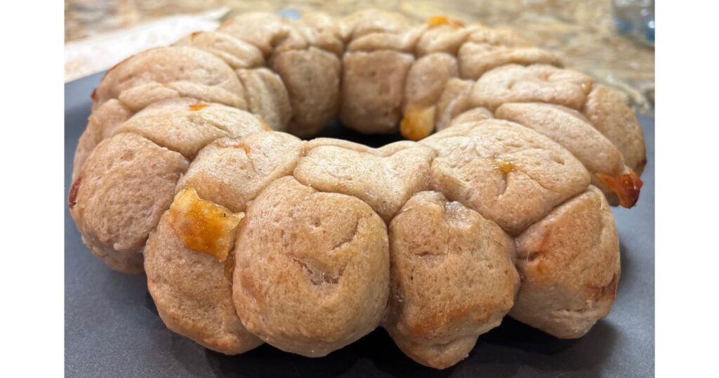 pull apart cheese bread on a baking sheet