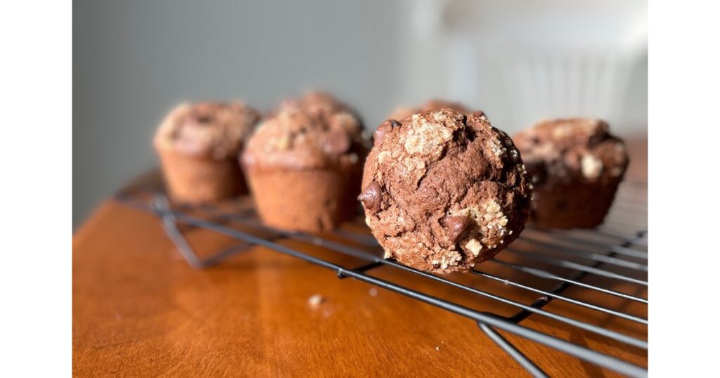 sourdough double chocolate muffins on cooling rack